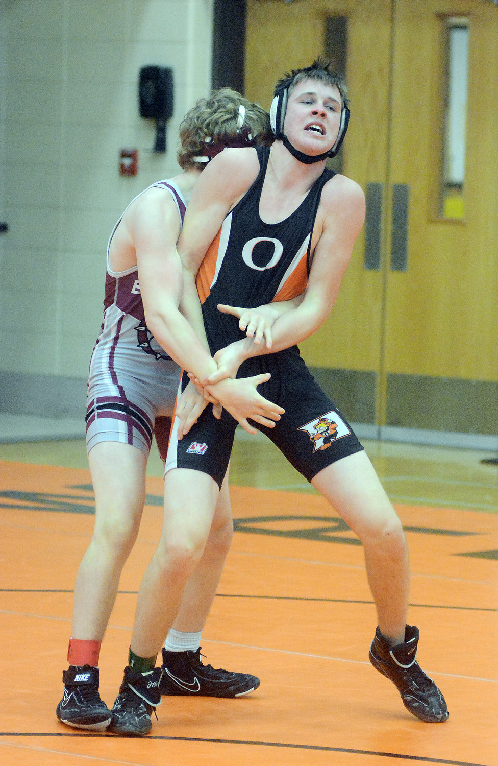 Kaleb Wells (front) looks to escape the grasp of Rolla’s Sawyer Black during wrestling action in the 152A weight class.